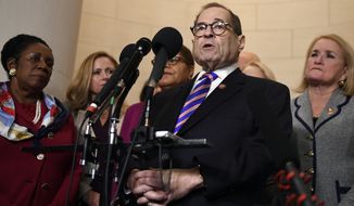 House Judiciary Committee Chairman Jerrold Nadler, D-N.Y., standing with other committee Democrats, talks to reporters following the House Judiciary Committee hearing on Capitol Hill in Washington, Wednesday, Dec. 4, 2019, on the on the constitutional grounds for the impeachment of President Donald Trump. (AP Photo/Susan Walsh)