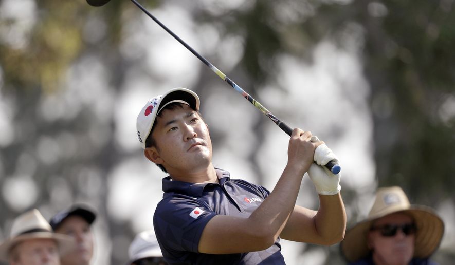 Takumi Kanaya of Japan tees off on the 17th hole during the opening round of the Australian Open Golf tournament in Sydney, Thursday, Dec. 5, 2019. (AP Photo/Rick Rycroft)