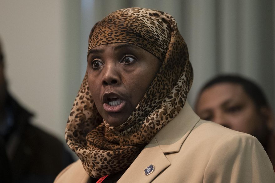 In this Dec. 19, 2018 photo, Movita Johnson-Harrell, a supervisor for the Victim Witness Services unit, speaks with members of the media during a news conference in Philadelphia. Johnson-Harrell, a state House representative from Philadelphia, won a special election in March 2019 and is facing charges after prosecutors accused her of enriching herself by stealing money from a non-profit organization she founded to serve the mentally ill and poor who were fighting addiction. The charges were filed Wednesday, Dec. 4, 2019, by Pennsylvania Attorney General Josh Shapiro's office. (AP Photo/Matt Rourke)