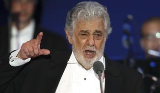 FILE- In this Aug. 28, 2019, file photo, opera singer Placido Domingo performs during a concert in Szeged, Hungary.  In an interview published Wednesday Dec. 4, 2019, in a leading Spanish newspaper, Domingo has sought to blame allegations of sexual harassment against him, on cultural differences between countries. (AP Photo/Laszlo Balogh, File)
