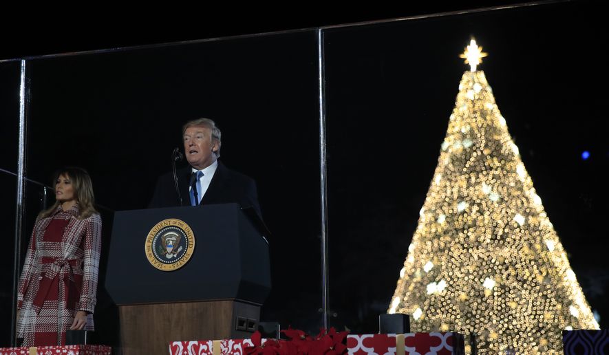 President Donald Trump and first lady Melania Trump attend the National Christmas Tree lighting ceremony at the Ellipse near the White House in Washington, Thursday, Dec. 5, 2019. (AP Photo/Manuel Balce Ceneta)