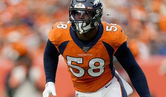 FILE - In this Sunday, Sept. 15, 2019 file photo, Denver Broncos outside linebacker Von Miller (58) lines up against the Chicago Bears during the second half of an NFL football game in Denver. Star linebacker Von Miller says his sprained left MCL that ended his 95-game starting streak might sideline him again Sunday, Dec. 8, 2019 when the Denver Broncos visit the Houston Texans. (AP Photo/Jack Dempsey, File)