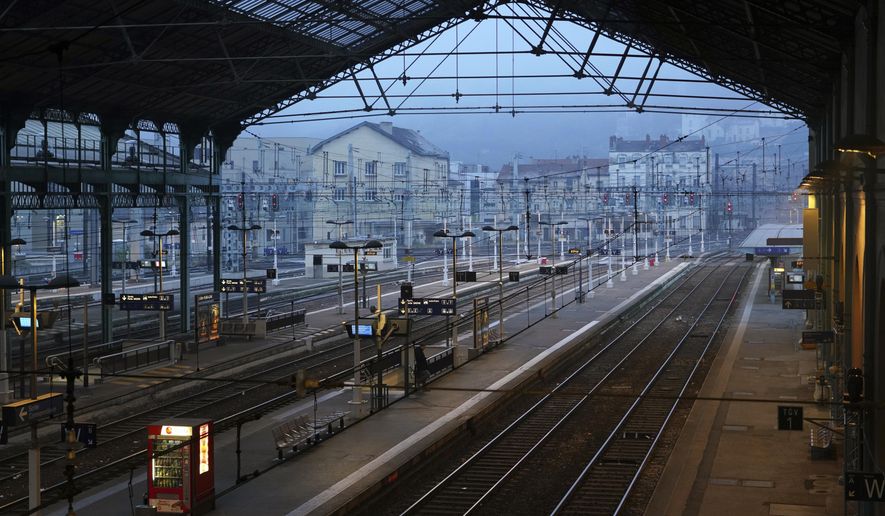 An empty platform is pictured during a railway strike at the Lyon Perrache train station, central France, Thursday, Dec. 5, 2019. Most French trains are at a standstill as unions hold nationwide strikes and protests over the government’s retirement reform. Schools are closed and the Eiffel Tower is warning visitors to stay away. Paris deployed 6,000 police for what’s expected to be a major demonstration Thursday through the capital. Workers fear the reform will make them work longer for smaller pensions. (AP Photo/Laurent Cipriani)