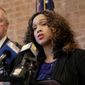 In this Dec. 3, 2019, photo. Maryland corrections secretary Robert Green, left, listens as Maryland State Attorney Marilyn Mosby, right, speaks during a news conference announcing the indictment of correctional officers, in Baltimore. (AP Photo/Julio Cortez) **FILE**