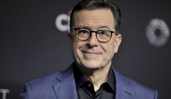 In this March 16, 2019, file photo, Stephen Colbert attends the 36th Annual PaleyFest &quot;An Evening with Stephen Colbert&quot; at the Dolby Theatre on Saturday, March 16, 2019, in Los Angeles. Now Prime Minister Jacinda Ardern may have found the perfect spokesman to embrace all of the above and more: American comedian Stephen Colbert. In an interview with The Associated Press on Thursday, Dec. 5, she talked about the boost to the country’s vital tourism industry that Colbert appears to have singlehandedly orchestrated.(Photo by Richard Shotwell/Invision/AP, File)