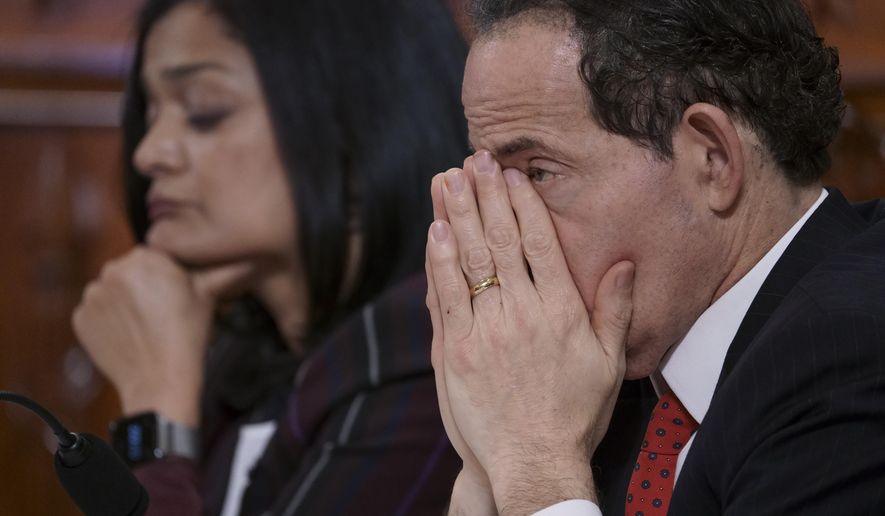 Rep. Jamie Raskin, D-Md., joined at left by Rep. Pramila Jayapal, D-Wash., listens to testimony from legal scholars during a House Judiciary Committee hearing on the constitutional grounds for the impeachment of President Donald Trump, on Capitol Hill in Washington, Wednesday, Dec. 4, 2019. (AP Photo/J. Scott Applewhite)