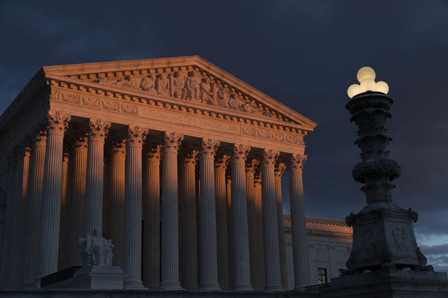 In this Jan. 24, 2019, file photo, the Supreme Court is seen at sunset in Washington. (AP Photo/J. Scott Applewhite, File) **FILE**
