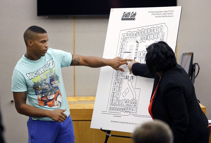 FILE - In this Sept. 24, 2019, file photo, victim Botham Jean's neighbor Joshua Brown, left, answers questions from Assistant District Attorney LaQuita Long while testifying during the murder trial of former Dallas Police Officer Amber Guyger, in Dallas. Authorities have indicted three men for capital in a shooting that killed Brown. (Tom Fox/The Dallas Morning News via AP, Pool)