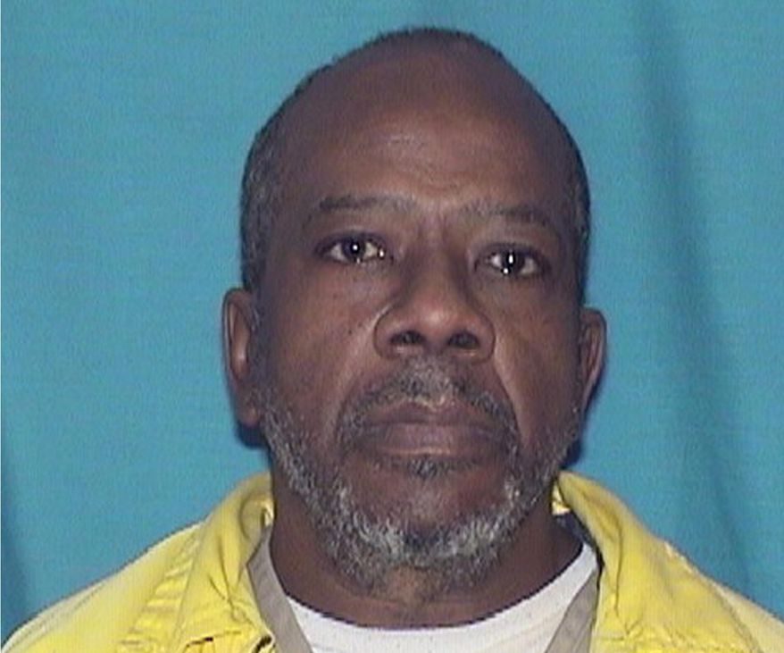 FILE -This undated photo provided by the Illinois Department of Corrections shows Larry Earvin, a former inmate at Western Illinois Correctional Center in Mt Sterling, Ill. Three prison guards face federal assault and civil rights violations charges in his death. (Illinois Department of Corrections via AP File)