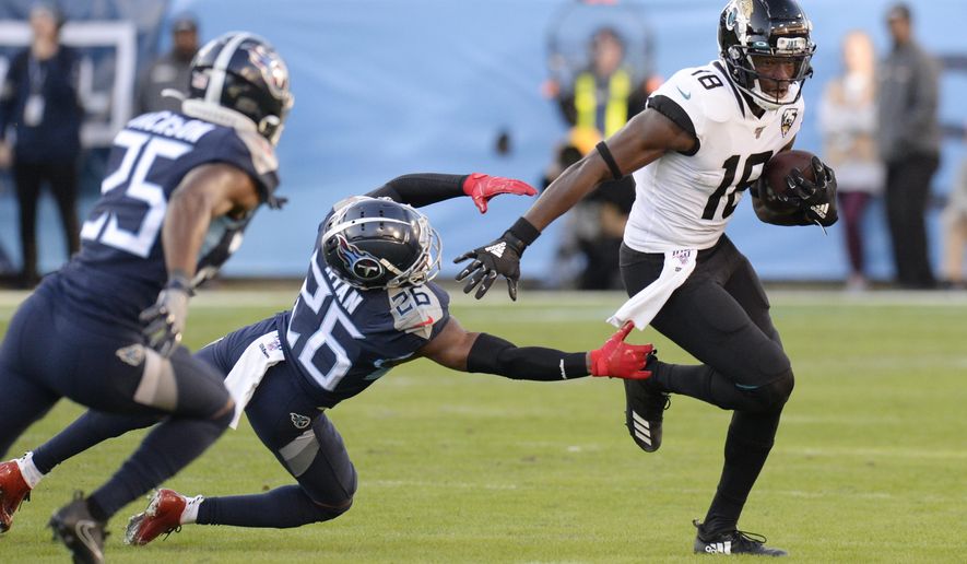 Jacksonville Jaguars wide receiver Chris Conley (18) gets past Tennessee Titans cornerback Logan Ryan (26) in the first half of an NFL football game Sunday, Nov. 24, 2019, in Nashville, Tenn. (AP Photo/Mark Zaleski)