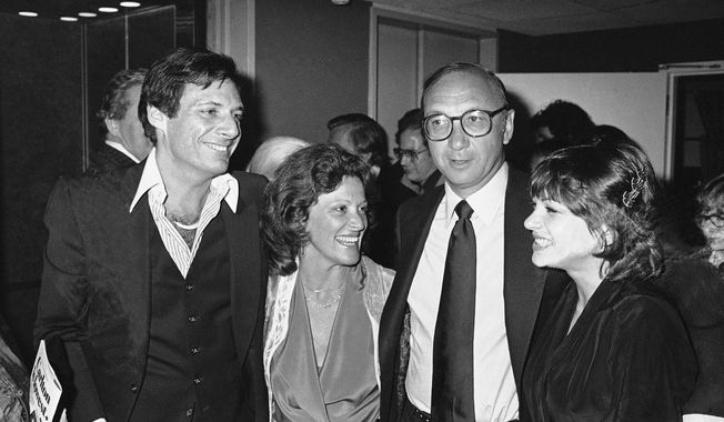 FILE - This April 3, 1980 file photo shows Ron Leibman, from left, his wife Linda Lavin, playwright Neil Simon and Dinah Manoff in New York following the opening of the play "I Ought to be in Pictures." Leibman, who appeared in movies, theater and television in a career that spanned six decades and won a Tony for Tony Kushner's iconic play ”Angels in America," has died after an illness at age 82. Leibman's agent, Robert Attermann, said the actor died Friday, Dec. 6, 2019. (AP Photo/Ray Stubblebine, File)