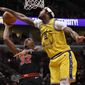 Chicago Bulls&#39; Kris Dunn (32) goes up for a shot against Golden State Warriors&#39; Willie Cauley-Stein (2) during the second half of an NBA basketball game Friday, Dec. 6, 2019, in Chicago. Golden State won 100-98. (AP Photo/Paul Beaty)
