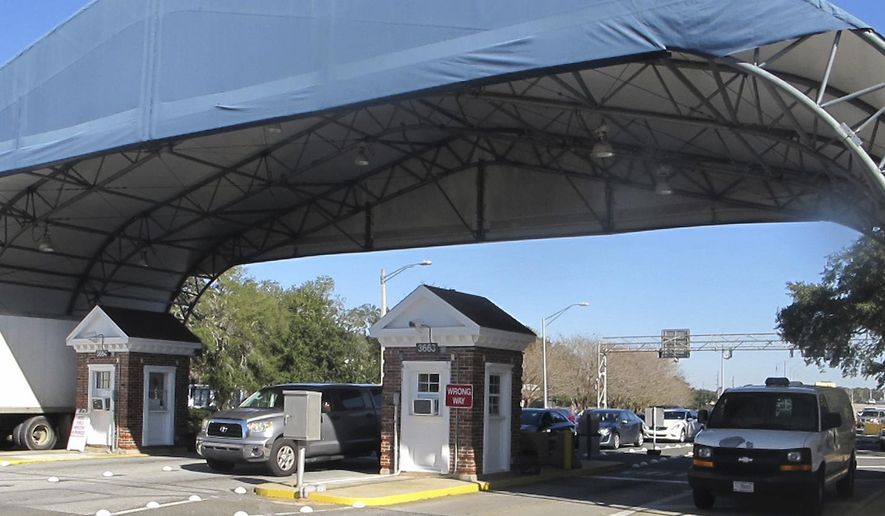 In this Jan. 29, 2016, file photo shows the entrance to the Naval Air Base Station in Pensacola, Fla.  (AP Photo/Melissa Nelson, File) **FILE**