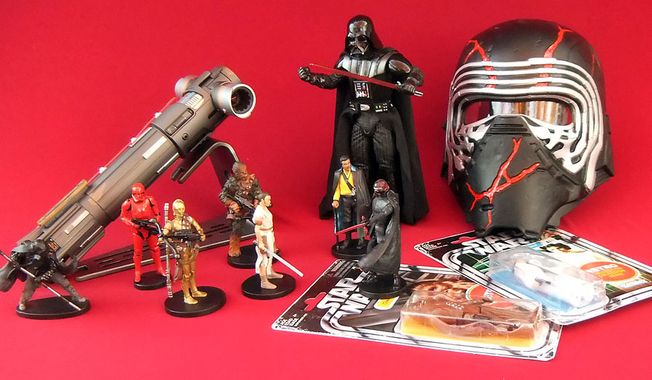 Gift ideas for &quot;Star Wars&quot; fans include Supreme Leader Kylo Ren Force FX Elite Lightsaber, Hyperreal Darth Vader, “Star Wars: The Rise of Skywalker” Deluxe Figure set, Retro Princess Lei Organa and Kylo Ren Force Rage Mask. (Photograph by Joseph Szadkowski / The Washington Times)
