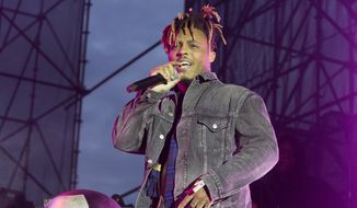 Juice Wrld performs in concert during his &quot;Death Race for Love Tour&quot; at The Skyline Stage at The Mann Center for the Performing Arts on Wednesday, May 15, 2019, in Philadelphia. (Photo by Owen Sweeney/Invision/AP)