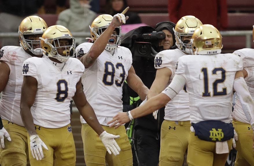 Notre Dame's Chase Claypool (83) celebrates after scoring a touchdown against Stanford in the second half of an NCAA college football game Saturday, Nov. 30, 2019, in Stanford, Calif. (AP Photo/Ben Margot)