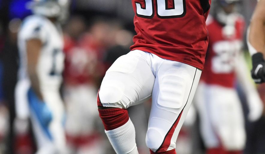 Atlanta Falcons defensive end Takkarist McKinley (98) celebrtates a tackle against the Carolina Panthers during the second half of an NFL football game, Sunday, Dec. 8, 2019, in Atlanta. (AP Photo/Danny Karnik)