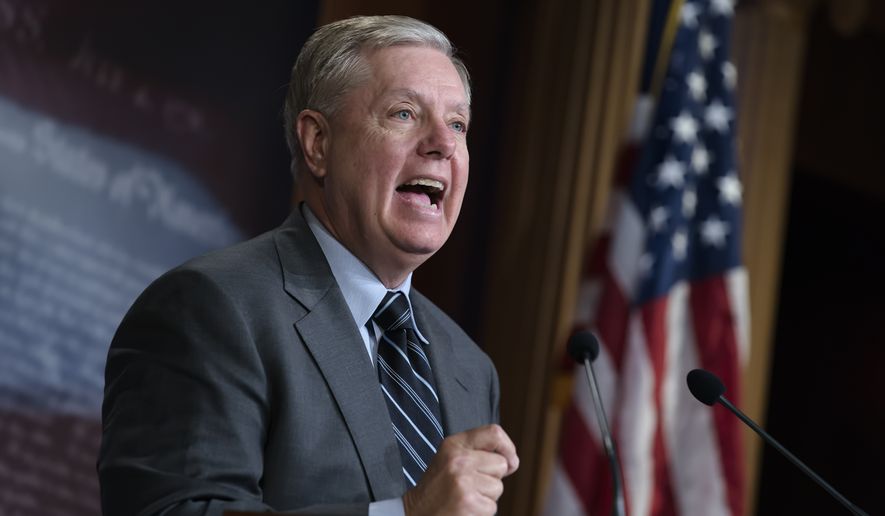 Senate Judiciary Committee Chairman Lindsey Graham, R-S.C., denounces a report by the Justice Department&#39;s internal watchdog that concluded the FBI was justified in opening its investigation into ties between the Trump presidential campaign and Russia and did not act with political bias, on Capitol Hill in Washington, Monday, Dec. 9, 2019. (AP Photo/J. Scott Applewhite)