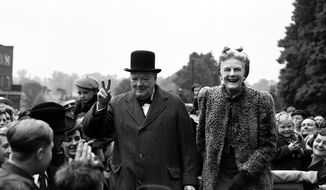 FILE - In this May 26, 1945 file photo, Britain&#39;s Prime Minister Winston Churchill and his wife Clementine tour Churchill&#39;s constituency of Woodford, in Essex, England, as part of the Conservative&#39;s General Election campaign. Britain is facing the most testing and significant, some would say tortuous, period in its modern history since World War II. The polarized electorate now has a critical choice to make _but it seems unlikely the result, whatever it may be, will heal deep and toxic divisions that could last a generation or more. (AP Photo/Eddie Worth, File)