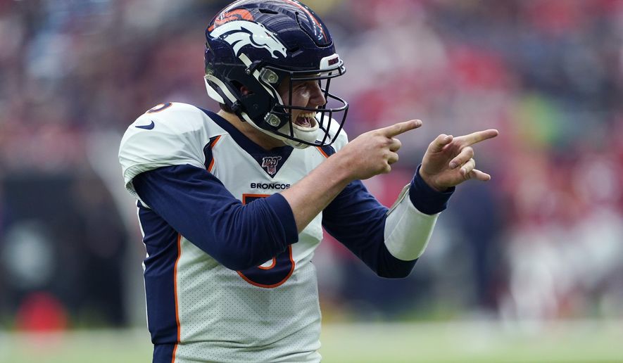 Denver Broncos quarterback Drew Lock (3) celebrates a touchdown against the Houston Texans during the second half of an NFL football game Sunday, Dec. 8, 2019, in Houston. (AP Photo/David J. Phillip)