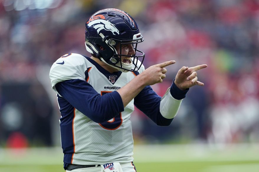 Denver Broncos quarterback Drew Lock (3) celebrates a touchdown against the Houston Texans during the second half of an NFL football game Sunday, Dec. 8, 2019, in Houston. (AP Photo/David J. Phillip)