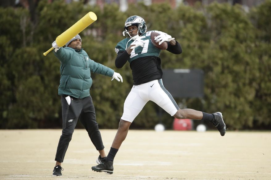 Philadelphia Eagles wide receiver Alshon Jeffery catches a pass at the NFL football team's practice facility in Philadelphia, Thursday, Dec. 5, 2019. (AP Photo/Matt Rourke)