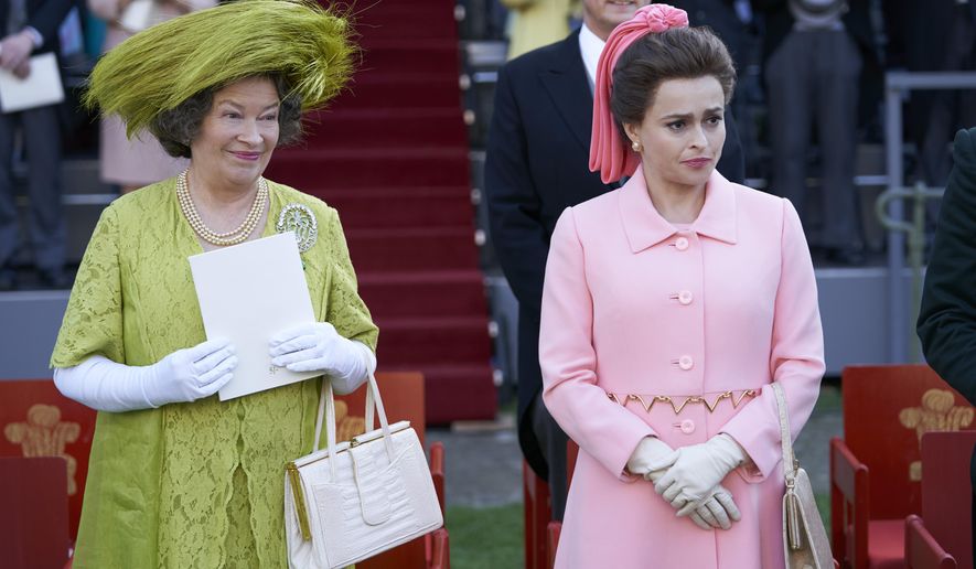 In this image released by Netflix, Marion Bailey portrays Queen Elizabeth the Queen Mother, left, and Helena Bonham Carter portrays Princess Margaret in a scene from the third season of "The Crown." On Monday, Dec. 9, 2019, Bonham Carter was nominated for a Golden Globe for best supporting actress in a series, limited series or TV movie. (Des Willie/Netflix via AP)