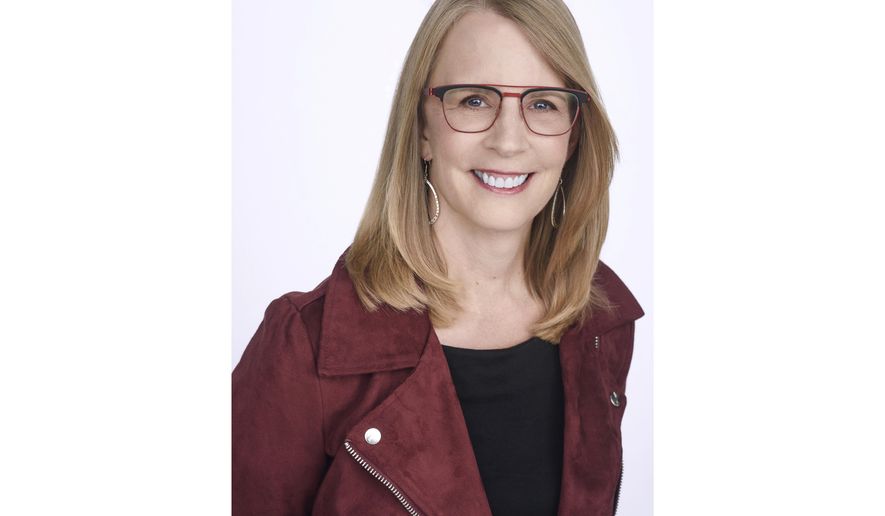 This undated photo provided by NerdWallet shows Liz Weston, a columnist for personal finance website NerdWallet.com. Companies are experimenting with employee emergency fund programs to help workers meet unexpected expenses. Some are even offering an employer match. (NerdWallet via AP)