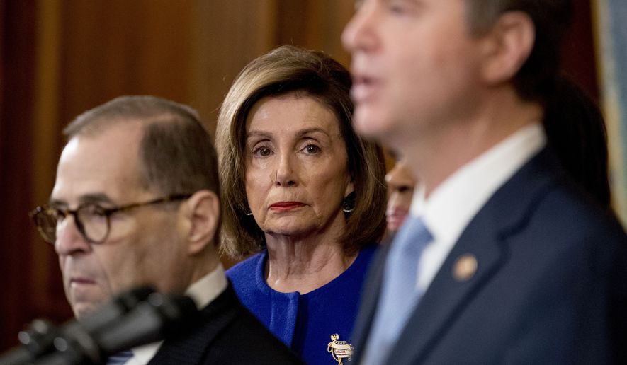 House Speaker Nancy Pelosi of Calif., center, and Chairman of the House Judiciary Committee Jerrold Nadler, D-N.Y., left, listen as Adam Schiff, D-Calif., Chairman of the House Intelligence Committee, foreground, speaks during a news conference to unveil articles of impeachment against President Donald Trump, abuse of power and obstruction of Congress, Tuesday, Dec. 10, 2019, on Capitol Hill in Washington. (AP Photo/Andrew Harnik)
