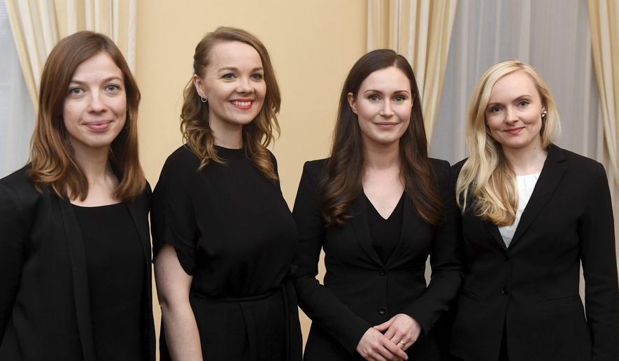 The new Prime Minister of Finland Sanna Marin, 2nd right, with Minister of Education Li Andersson, left, Minister of Finance Katri Kulmuni, 2nd left, and Minister of Interior Maria Ohisalo, right, after the first meeting of the new government in Helsinki, Finland on Tuesday, Dec. 10, 2019.  Finland’s parliament chose Sanna Marin as the country&#x27;s new prime minister Tuesday, making the 34-year-old the world’s youngest sitting head of government. (Heikki Saukkomaa/Lehtikuva via AP)