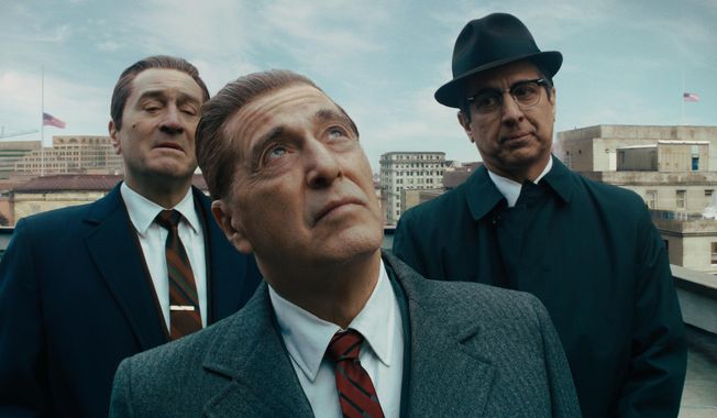 This image released by Netflix shows, from left, Robert De Niro, Al Pacino and Ray Romano in a scene from &amp;quot;The Irishman.&amp;quot; On Monday, Dec. 9, 2019, Pacino was nominated for a Golden Globe for best supporting actor in a motion picture for his role in the film.(Netflix via AP)
