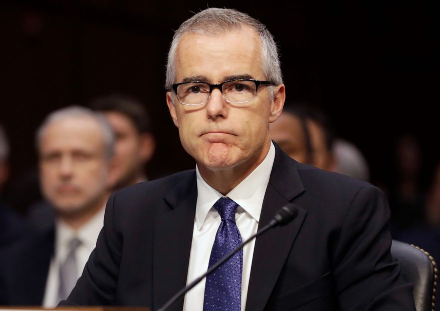 In this file photo, then-acting FBI Director Andrew McCabe listens on Capitol Hill in Washington, Thursday, May 11, 2017, while testifying before a Senate Intelligence Committee hearing on major threats facing the U.S. (AP Photo/Jacquelyn Martin) ** FILE **
