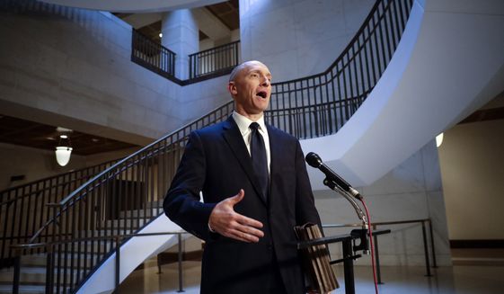 Carter Page, a foreign policy adviser to Donald Trump&#39;s 2016 presidential campaign, speaks with reporters following a day of questions from the House Intelligence Committee on Thursday, Nov. 2, 2017, on Capitol Hill in Washington. (AP file Photo/J. Scott Applewhite, File) ** FILE **