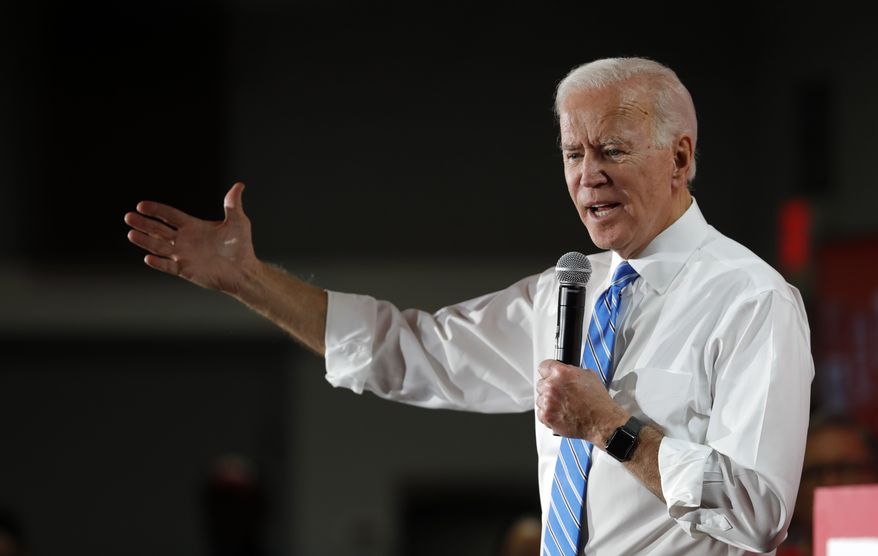 Democratic presidential candidate and former Vice President Joe Biden responds to a question during town hall meeting at the Culinary Union, Local 226, headquarters in Las Vegas Wednesday, Dec. 11, 2019. (Steve Marcus/Las Vegas Sun via AP)