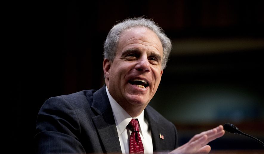 Department of Justice Inspector General Michael Horowitz testifies at a Senate Judiciary Committee hearing on the Inspector General&#39;s report on alleged abuses of the Foreign Intelligence Surveillance Act, Wednesday, Dec. 11, 2019, on Capitol Hill in Washington. (AP Photo/Andrew Harnik) ** FILE **