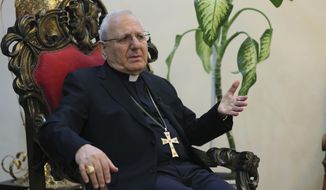 In this Thursday, Dec. 5, 2019 photo, Cardinal Louis Raphael Sako, patriarch of the Chaldean Church, speaks during an interview with The Associated Press in Baghdad, Iraq. Leaders of Iraq&#x27;s Christians unanimously cancelled Christmas-related celebrations in solidarity with the protest movement - but the aims of their stance go deeper than tinsel and fairy lights. In the slogans calling for a united Iraq, Christians see hope for much needed change from a sectarian system that has long marginalized them. (AP Photo/Khalid Mohammed)