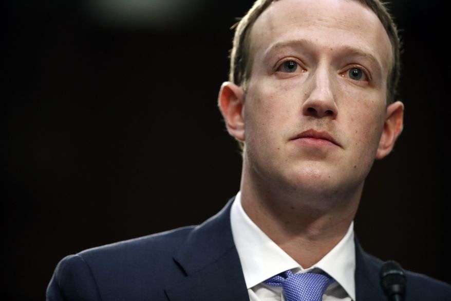 In this Tuesday, April 10, 2018, file photo, Facebook CEO Mark Zuckerberg testifies before a joint hearing of the Commerce and Judiciary Committees on Capitol Hill in Washington, about the use of Facebook data to target American voters in the 2016 election. (AP Photo/Alex Brandon, File)