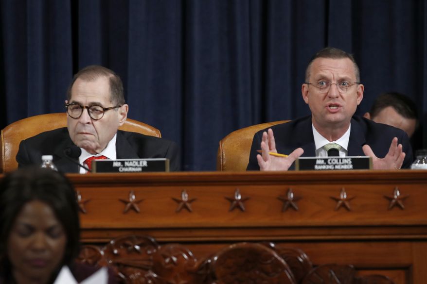 House Judiciary Committee Chairman Rep. Jerrold Nadler, D-N.Y., listens as ranking member Rep. Doug Collins, R-Ga., speaks during a House Judiciary Committee markup of the articles of impeachment against President Donald Trump, on Capitol Hill Thursday, Dec. 12, 2019, in Washington. (AP Photo/Alex Brandon)