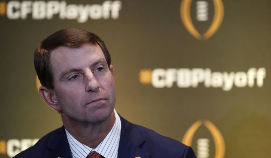 Clemson head coach Dabo Swinney speaks during a news conference ahead for the College Football playoffs Thursday, Dec. 12, 2019, in Atlanta. Ryan Day of Ohio State was unable to attend. (AP Photo/John Bazemore)