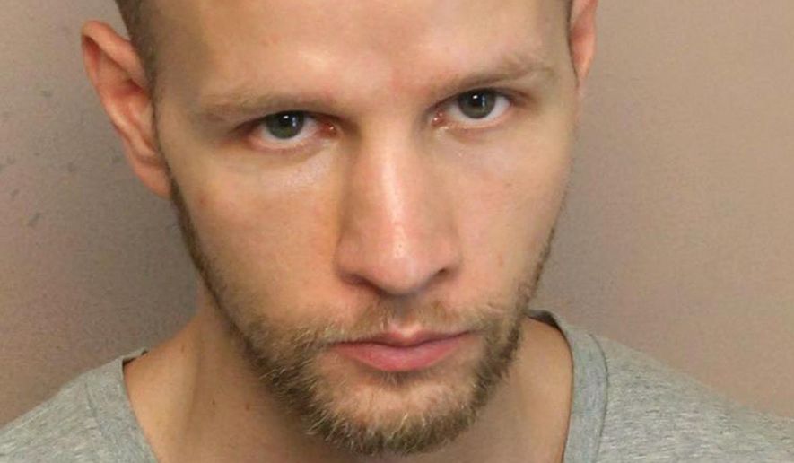 FILE - This undated file photo provided by the Nashville Police Department shows Daniel Everette Hale. A judge has allowed prosecutors to move forward with their case against Hale, a former intelligence analyst charged with leaking classified documents about military campaigns to a reporter, according to court papers unsealed Wednesday, Dec. 11, 2019. Hale of Nashville, Tenn., is charged in federal court in Alexandria, Va., under the World War I-era Espionage Act. (Nashville Police Department via AP, File)