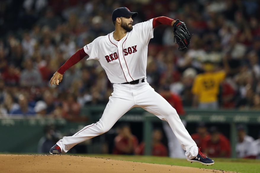 FILE - In this Sept. 8, 2019, file photo, Boston Red Sox's Rick Porcello pitches during the first inning of a baseball game against the New York Yankees, in Boston. Former AL Cy Young Award winner Rick Porcello and the New York Mets have a agreed to a $10 million, one-year contract, a person with knowledge of the negotiations told The Associated Press. The person spoke on condition of anonymity Thursday, Dec. 12, 2019, because the agreement had not been announced. (AP Photo/Michael Dwyer, File)