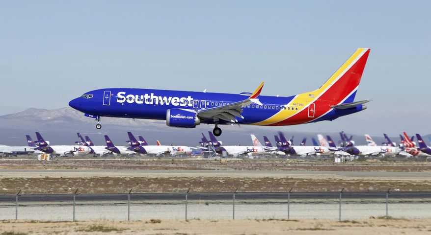 FILE - In this March 23, 2019, file photo, a Southwest Airlines Boeing 737 Max aircraft lands at the Southern California Logistics Airport in the high desert town of Victorville, Calif. The union president of Southwest Airlines pilots worries that Boeing may be rushing the 737 Max back into service, and he says Southwest should consider buying planes from another company. The union president, Jon Weaks, adds that Boeing has exhibited arrogance and greed that will haunt the company forever. (AP Photo/Matt Hartman, File)