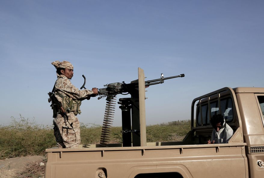 FILE - In this Feb. 12, 2018 file photo, Saudi-backed forces, part of Ahmed al-Kawkabani's, southern resistance unit in Hodeida, patrol in Hodeida, Yemen. Several international aid groups warned on Thursday, Dec. 12, 2019 that the flashpoint Yemeni city at the heart of last year's peace agreement signed in Sweden remains the most dangerous place in the war-torn, impoverished Arab country. Fifteen aid agencies -- including the Norwegian Refugee Council, CARE International, Medecins du Monde and Oxfam -- say that since the U.N.-brokered deal last December, the port city of Hodeida and the surrounding province has seen 799 civilians killed and wounded. (AP Photo/Nariman El-Mofty, File)