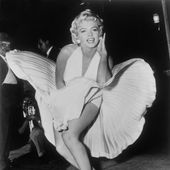 In this Sept. 9, 1954, file photo, Marilyn Monroe poses over the updraft of a New York subway grate while filming &quot;The Seven Year Itch&quot; in New York. (AP Photo/Matty Zimmerman, File)