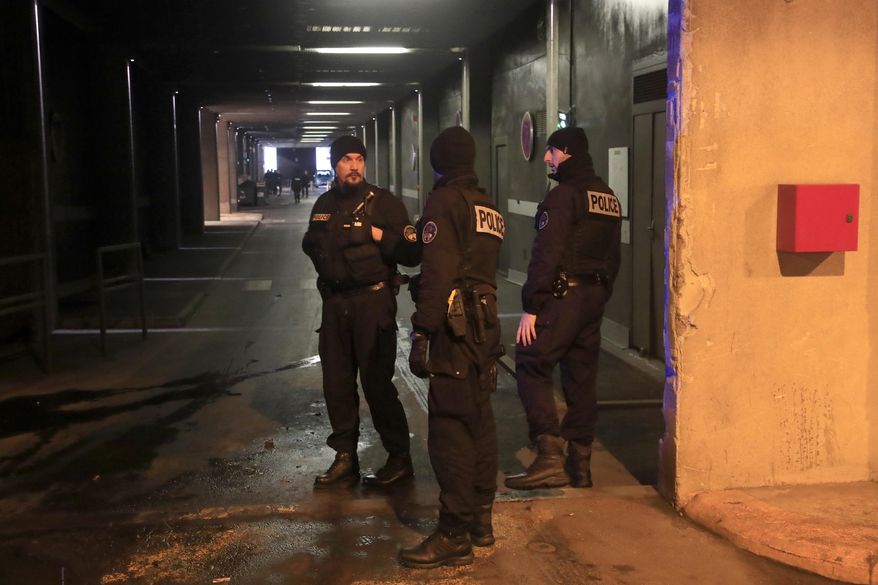 Police officers patrol in a tunnel under La Defense business district after a man threatened officers Friday, Dec.13, 2019 in Paris. Paris police say officers "neutralized" a man who threatened officers with a knife Friday morning in the French capital's main business district. (AP Photo/Michel Euler)