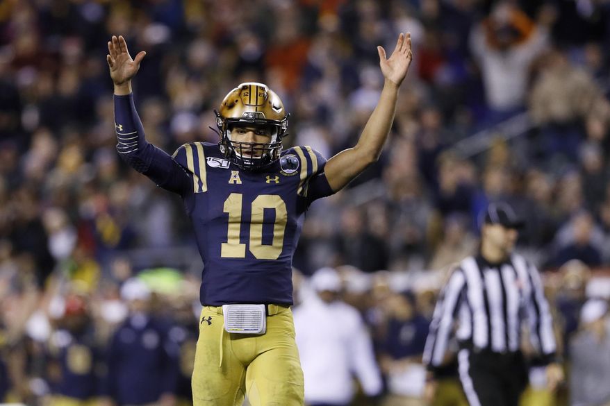 Navy's Malcolm Perry celebrates after a touchdown during the second half of an NCAA college football game against Army, Saturday, Dec. 14, 2019, in Philadelphia. (AP Photo/Matt Slocum)