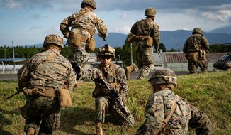 U.S. Marine Staff Sgt. Thomas R. Sterett takes accountability of Marines boarding U.S. Army Sikorsky UH-60 Black Hawks during Black Hawk integration training as part of exercise Fuji Viper 20-1 on Camp Fuji, Japan, Oct. 28, 2019. Fuji Viper is a regularly scheduled training evolution for infantry units assigned to 3rd Marine Division as part of the unit deployment program. The training allows units to maintain their lethality and proficiency in infantry and combined arms tactics. Sterett is assigned to 4th Marine Regiment, 3rd Marine Division, and a native of Town Falls, Idaho. (U.S. Marine Corps photo by Cpl. Timothy Hernandez)