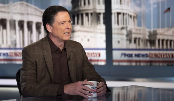 Former FBI Director James Comey talks with &quot;Fox News Sunday&quot; anchor Chris Wallace, Sunday morning, Dec. 15, 2019, in Washington. (AP Photo/Kevin Wolf)