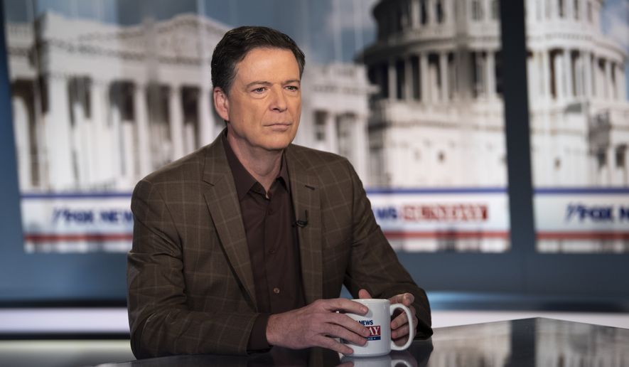 Former FBI Director James Comey talks with &quot;Fox News Sunday&quot; anchor Chris Wallace, Sunday morning, Dec. 15, 2019, in Washington. (AP Photo/Kevin Wolf)