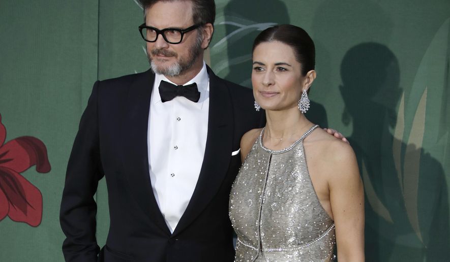 FILE - In this file photo dated Sunday, Sept. 22, 2019, British actor Colin Firth and his wife Livia, pose for photographers upon arrival at the Green Carpet Fashion Awards in Milan, Italy. A statement from their publicists says Colin and Italian eco-campaigner and film producer Livia Firth have separated after 22-years of marriage. (AP Photo/Luca Bruno, FILE)